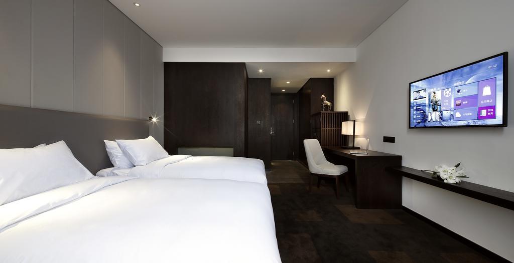 Ease House Luoyang Hotel Lojang Szoba fotó